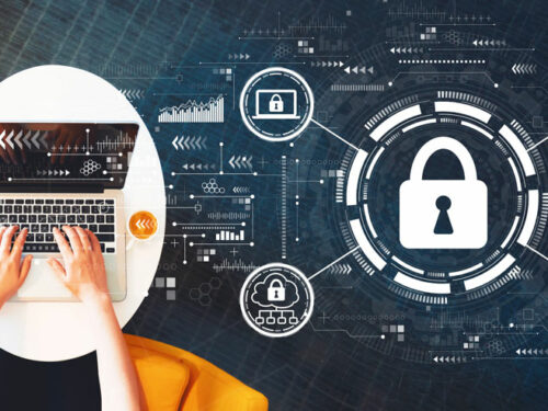 Internet network security concept with person using a laptop on a white table